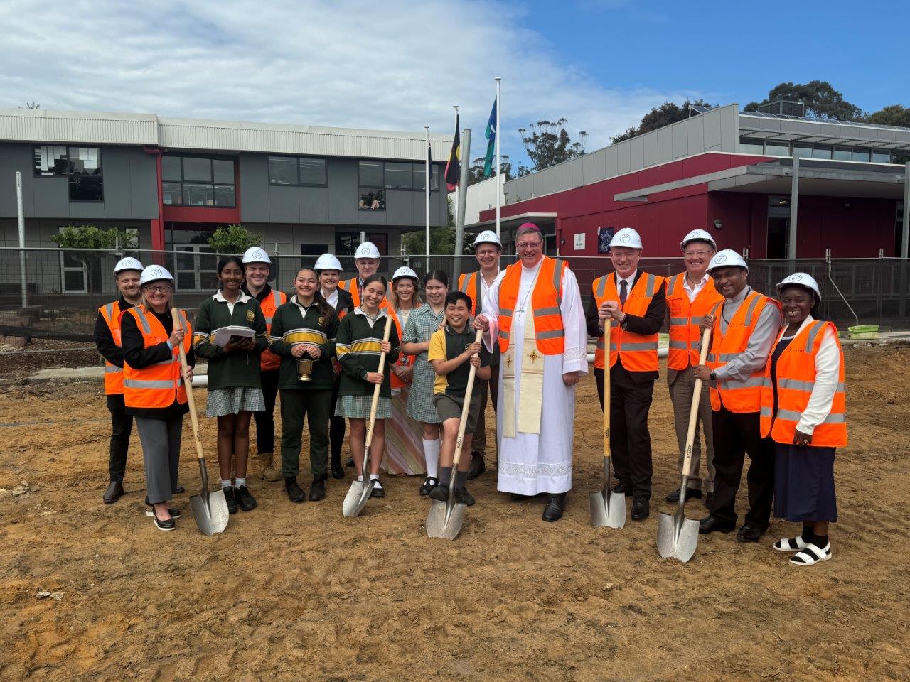 Bishop Greg and group turning sod at St Agathas PS 1