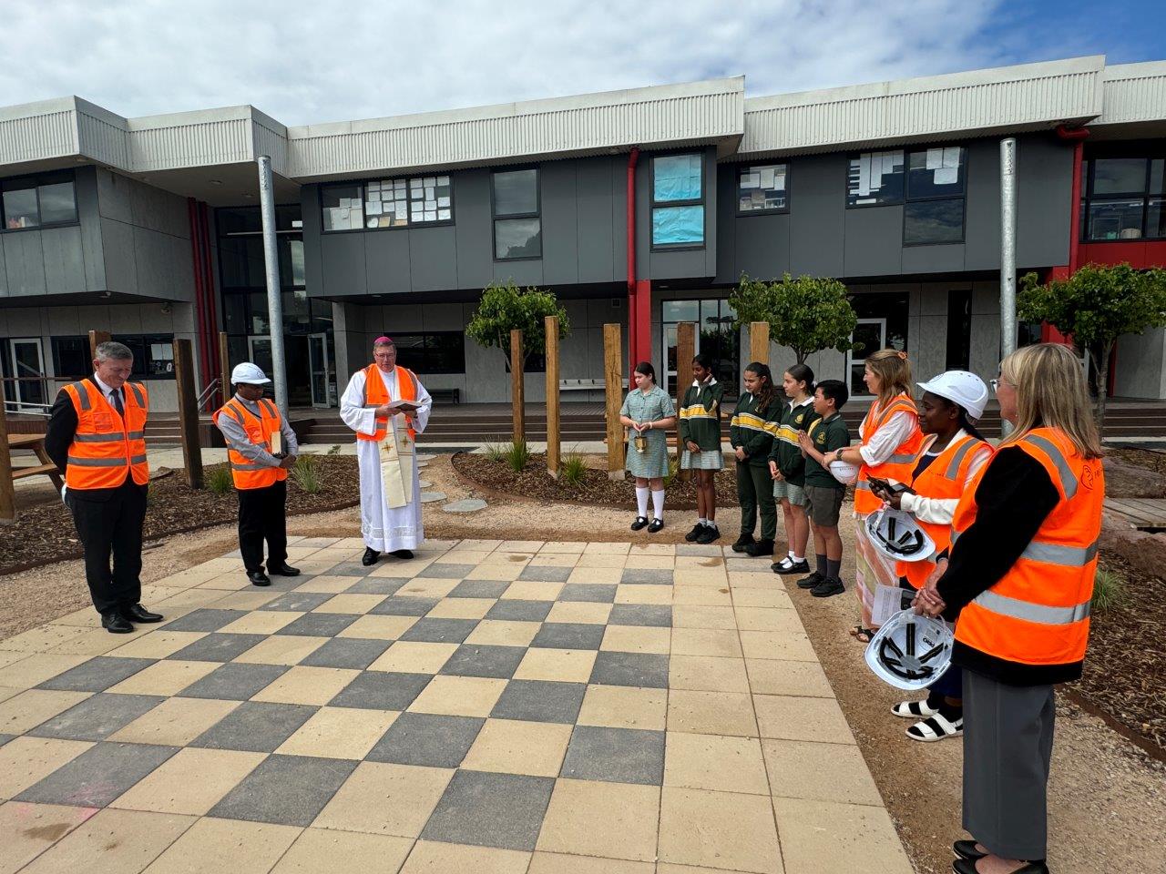 Bishop Greg blessing school project